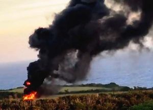 米軍ヘリが墜落したとみられる現場=11日午後6時前、東村高江(提供)