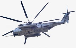 米軍機部品が見つかった後も緑ヶ丘保育園の上空を飛行する米軍CH53ヘリ=7日午後0時33分、宜野湾市野嵩