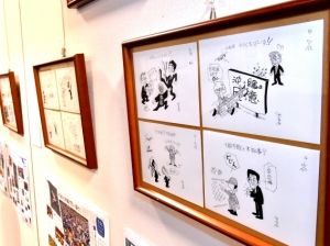 タイムスギャラリーで7月1日まで開かれている砂川友弘「時事漫評」原画展